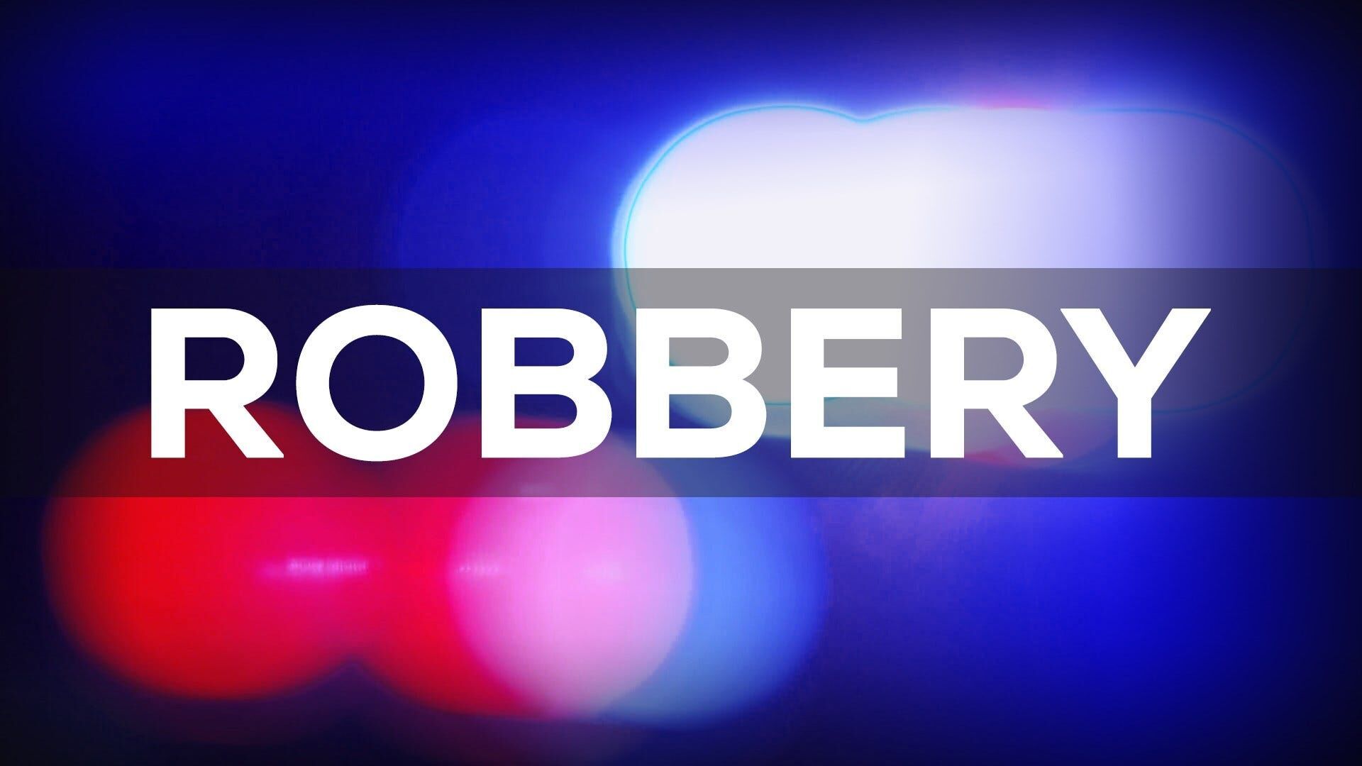 Bank clerk held at gunpoint during robbery Tuesday, police say